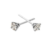 Pendientes con diamantes talla brillante engastados en garras