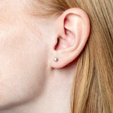 Pendientes con diamantes talla brillante engastados en garras