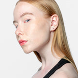 Pendientes con diamantes talla brillante engastados en garras