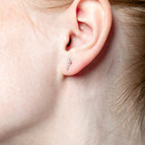 Pendientes trepadores con diamantes engastados en garras