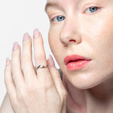 Solitario cruzado oro 18K