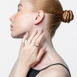 Solitario cruzado oro 18K