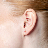 Pendientes con piedra talla redonda y diamante