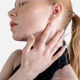 Sortija abierta con brillante talla oval