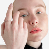 Sortija abierta con brillante talla oval