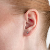 Pendientes con diamantes talla brillante engastados en chatón