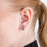 Aros con piedra de color y diamantes