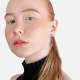 Aros con piedra de color y diamantes