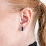 Aros con piedra de color y diamantes