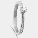 Solitario oro 18K engaste en cuatro garras y brazo con brillantes