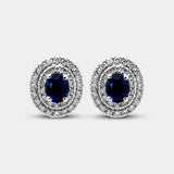 Pendientes con piedra talla oval y doble fila de diamantes