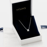 Colgante combinación diamantes talla baguette y diamantes negros