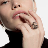 Sortija oro rosa con diamantes negros