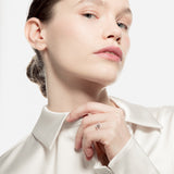 Sortija de oro blanco con diamante gris en bruto